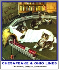 Tin Sign Kittens playing w/train